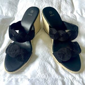 Brand new never been worn size 11 black wedges